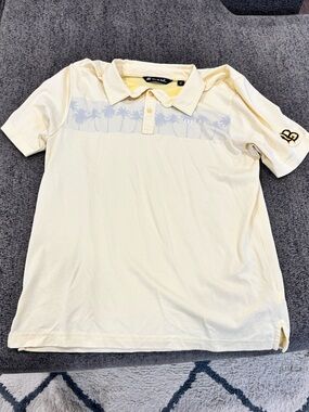 Travis Mathew Pale Yellow Polo with Subtle Palm Print